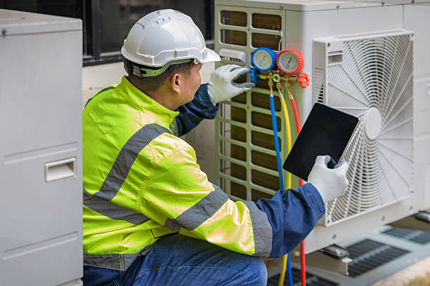Professional Hvac technician working in Bolton, MA